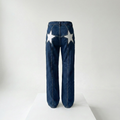Star | Embroidered star-print flare trousers