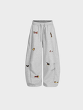 Carol | Barrel joggers with embroidered dogs