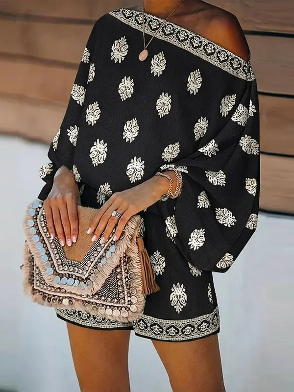 Short jumpsuit with baroque print, off-the-shoulder and flared sleeves