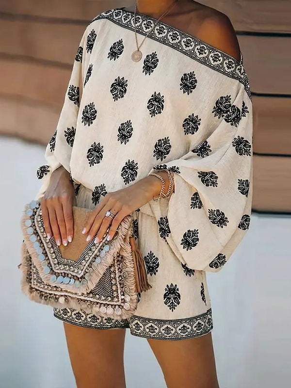 Short jumpsuit with baroque print, off-the-shoulder and flared sleeves