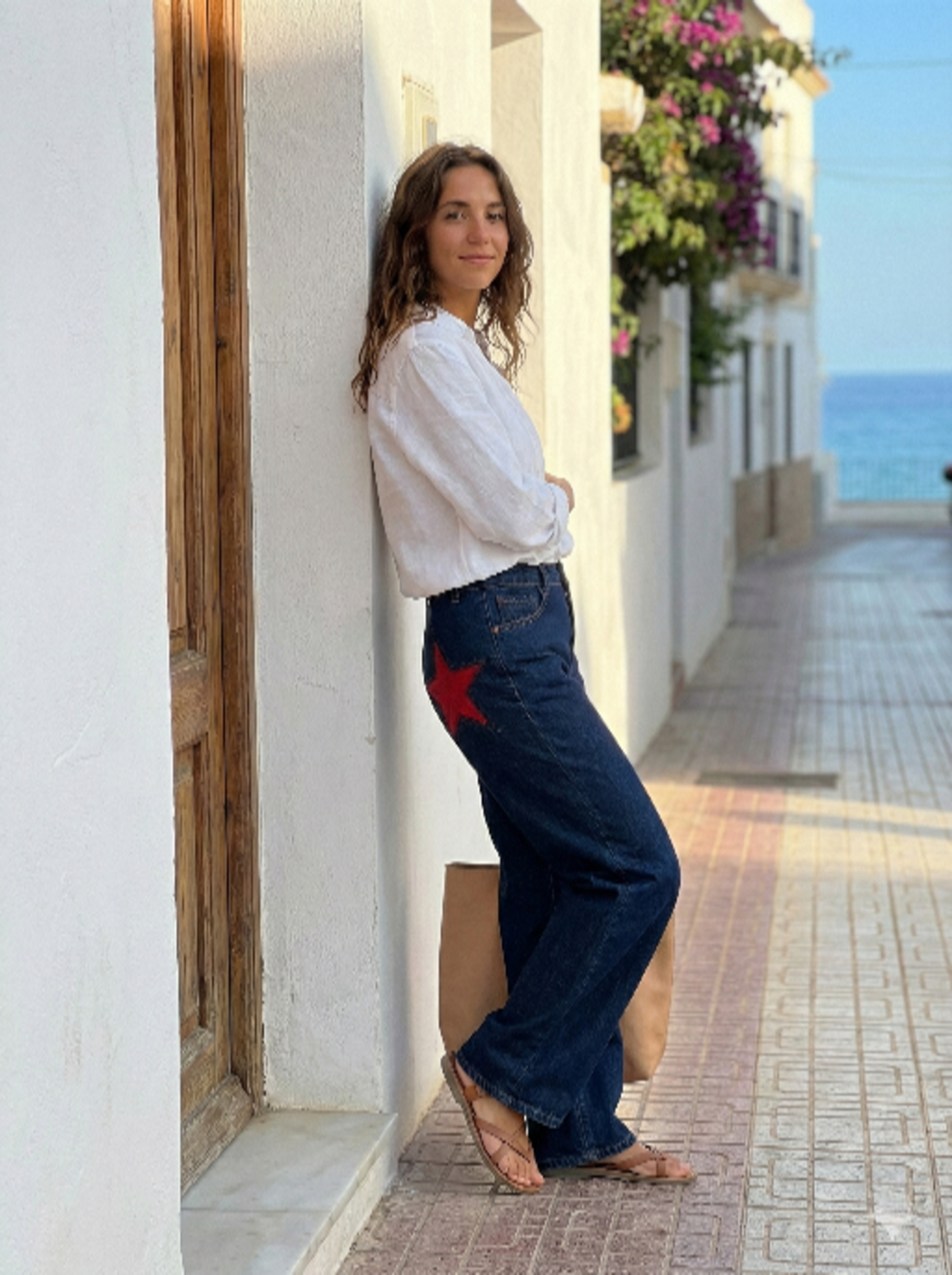Star | Embroidered star-print flare trousers