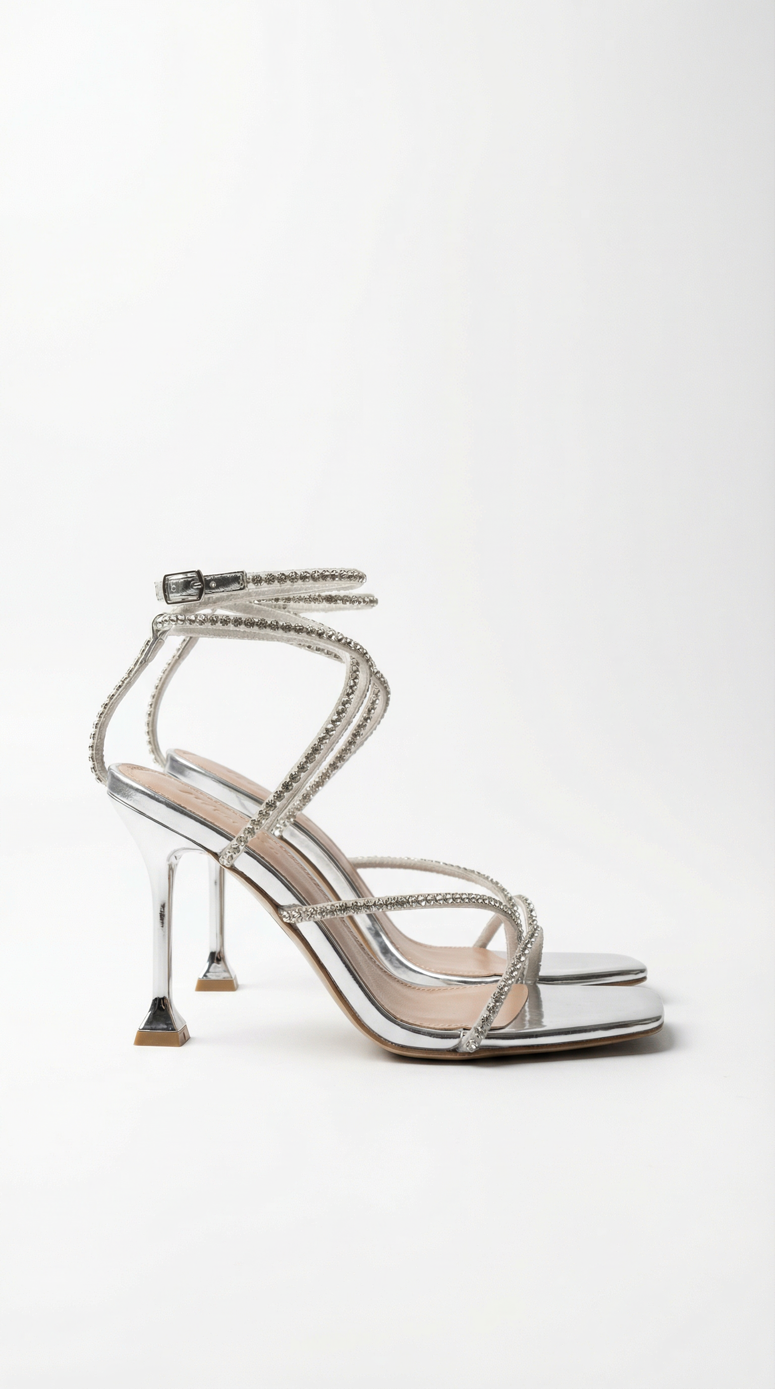 Jennifer's mid-heel ankle strap shoes