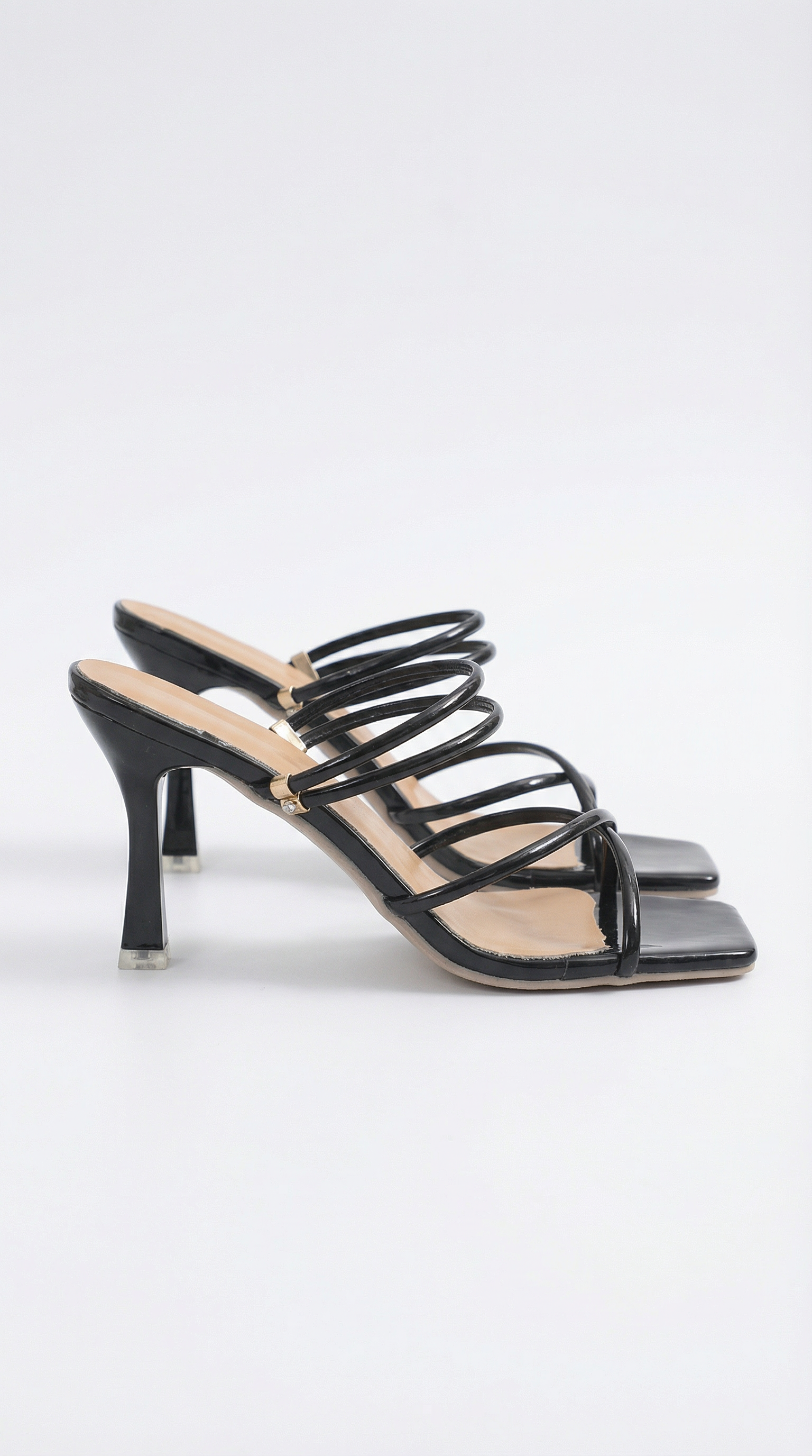 Karen's high-heeled sandals