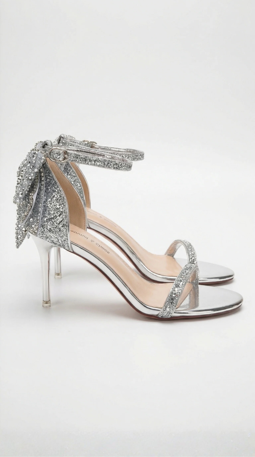 Heeled sandals with bow and rhinestones