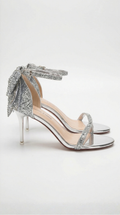 Heeled sandals with bow and rhinestones
